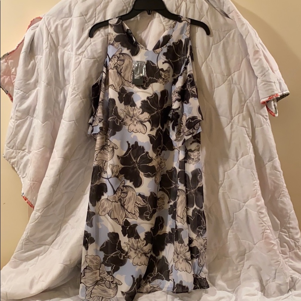 A mini length, off-shoulder dress